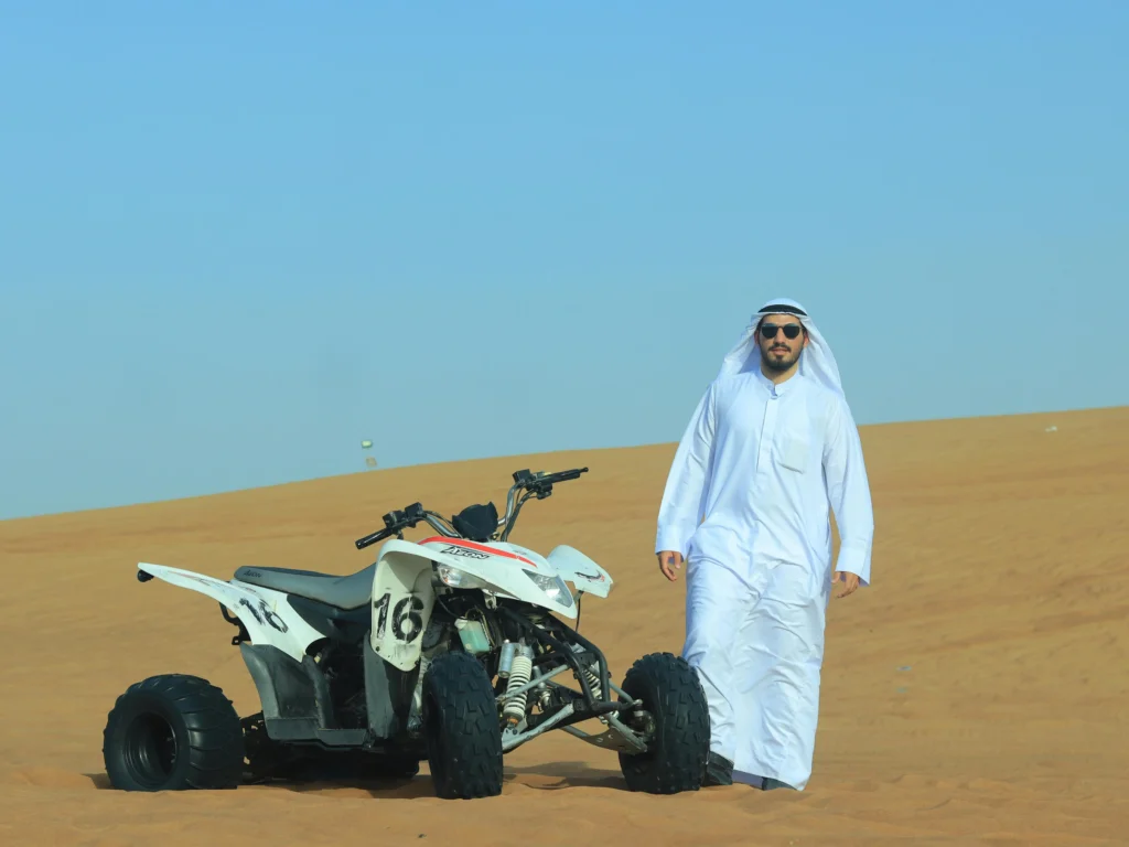 Naveed quad-bike-desert-with-sand-dunes-blue-sky_1308172-164949